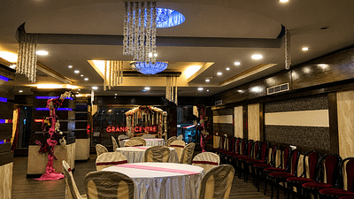 Elegant banquet hall setup with chandeliers
