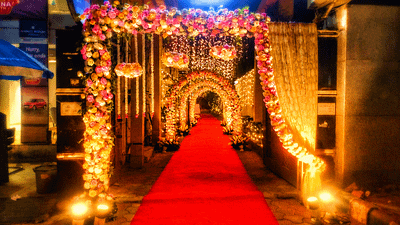 Floral tunnel entrance at night