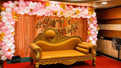 Gold sofa at festive birthday celebration