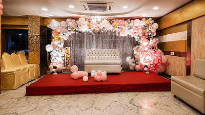 Pink and gold birthday celebration setup