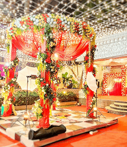 Wide view of Mangalam Banquets Kolkata showing decorated AC hall and lawn area for Hindu wedding celebrations.
