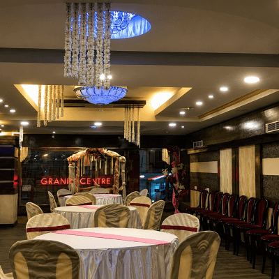 Elegant banquet hall setup with chandeliers