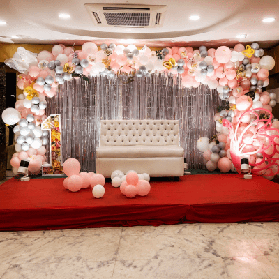 Pink and gold birthday celebration setup